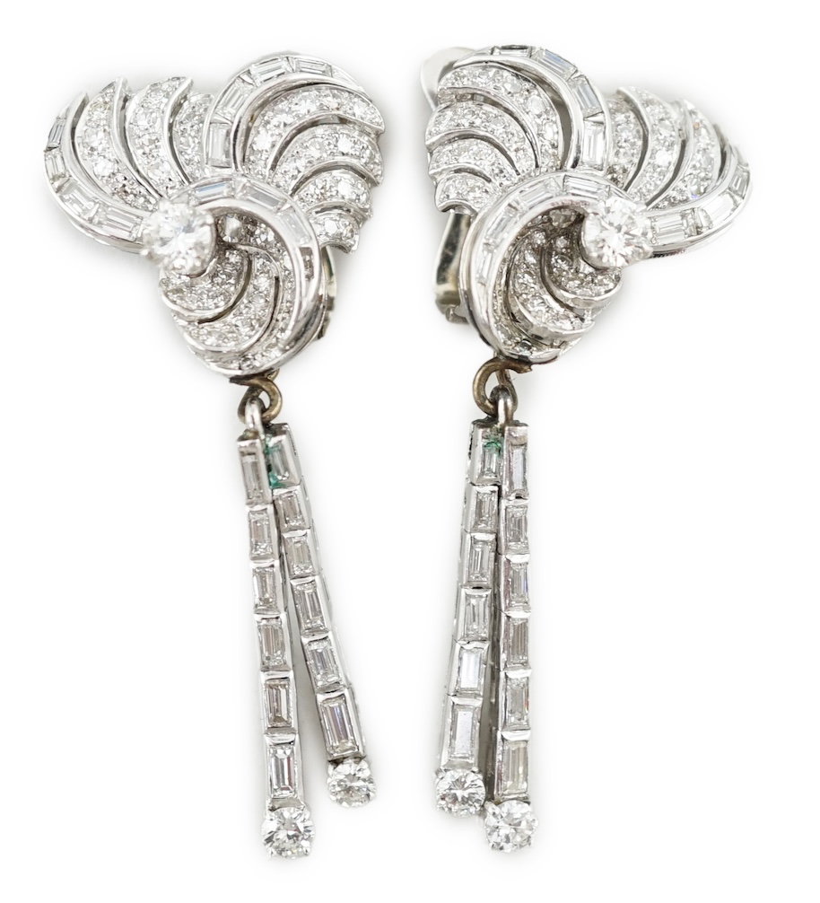 A pair of 1960's white gold and diamond cluster set drop ear clips